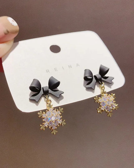 Silver Needle Zircon Snowflake Bow Earrings