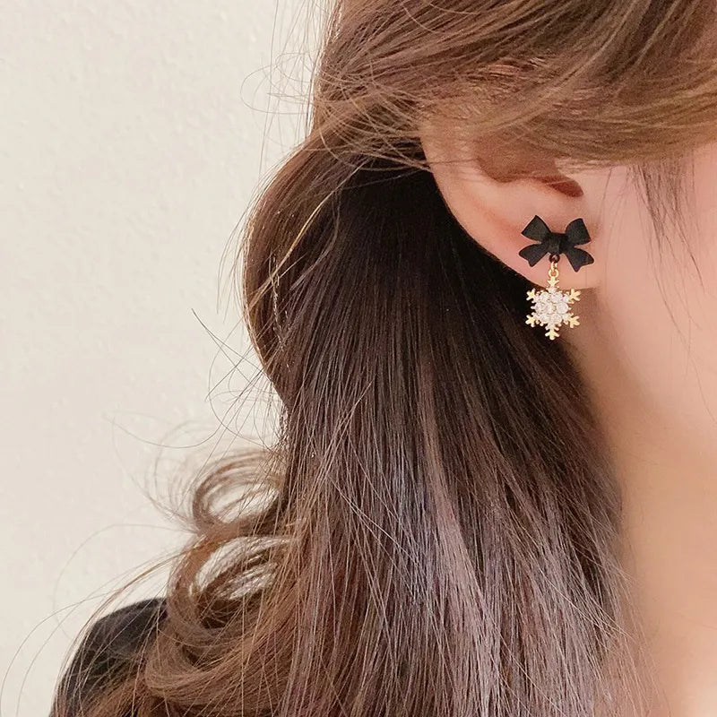 Silver Needle Zircon Snowflake Bow Earrings